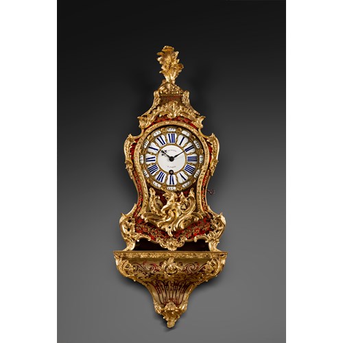 A Louis XV ormolu-mounted tortoise-shell cartel clock and bracket